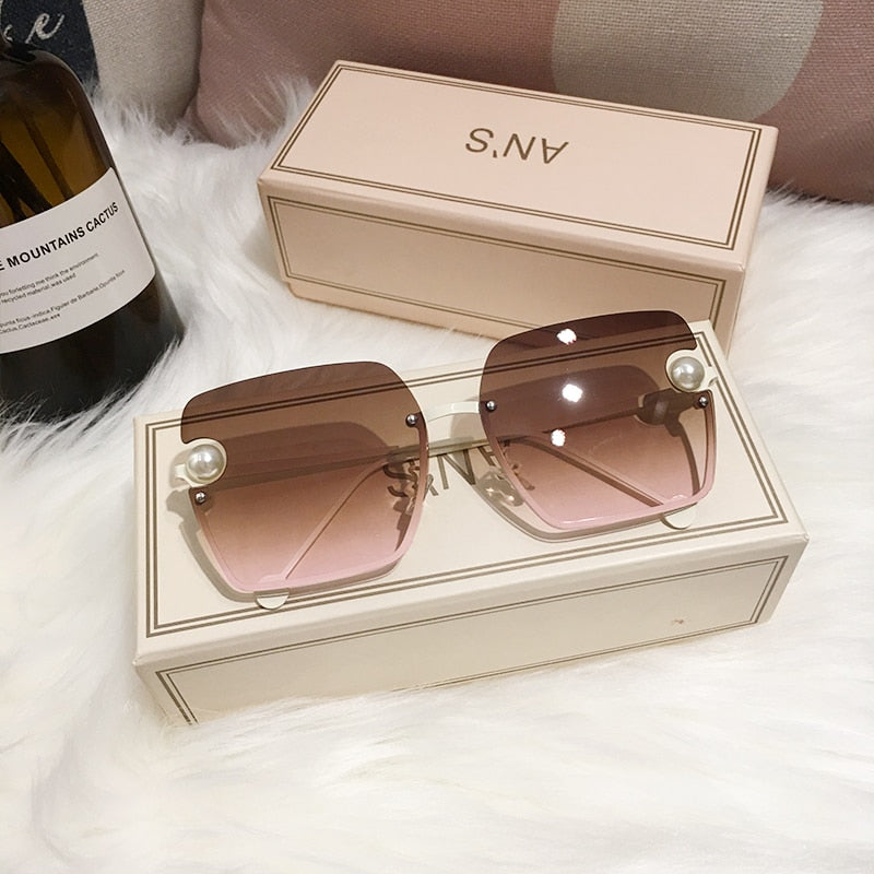 Ladies Rimless Sunglasses UV400 pearl.