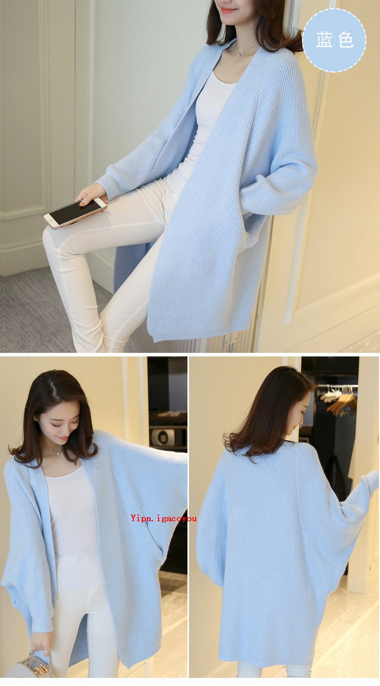 Ladies Long Knitted, bat sleeve Sweater.