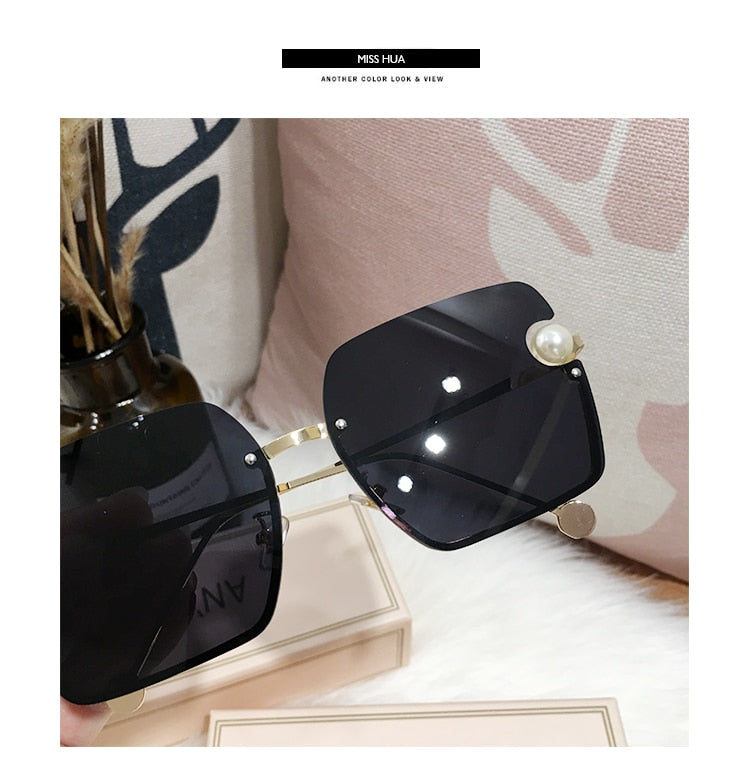 Ladies Rimless Sunglasses UV400 pearl.