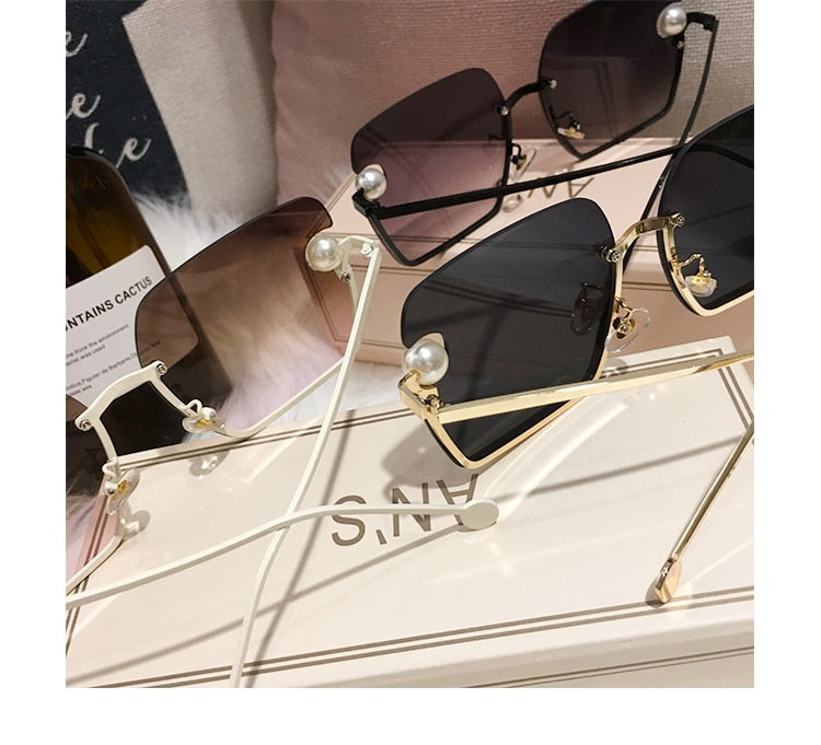 Ladies Rimless Sunglasses UV400 pearl.