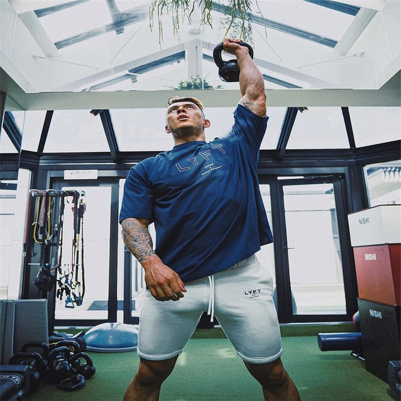 Men's gym sports casual cotton shorts for running and bodybuilding.