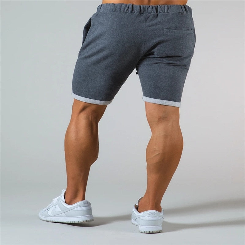 Men's gym sports casual cotton shorts for running and bodybuilding.