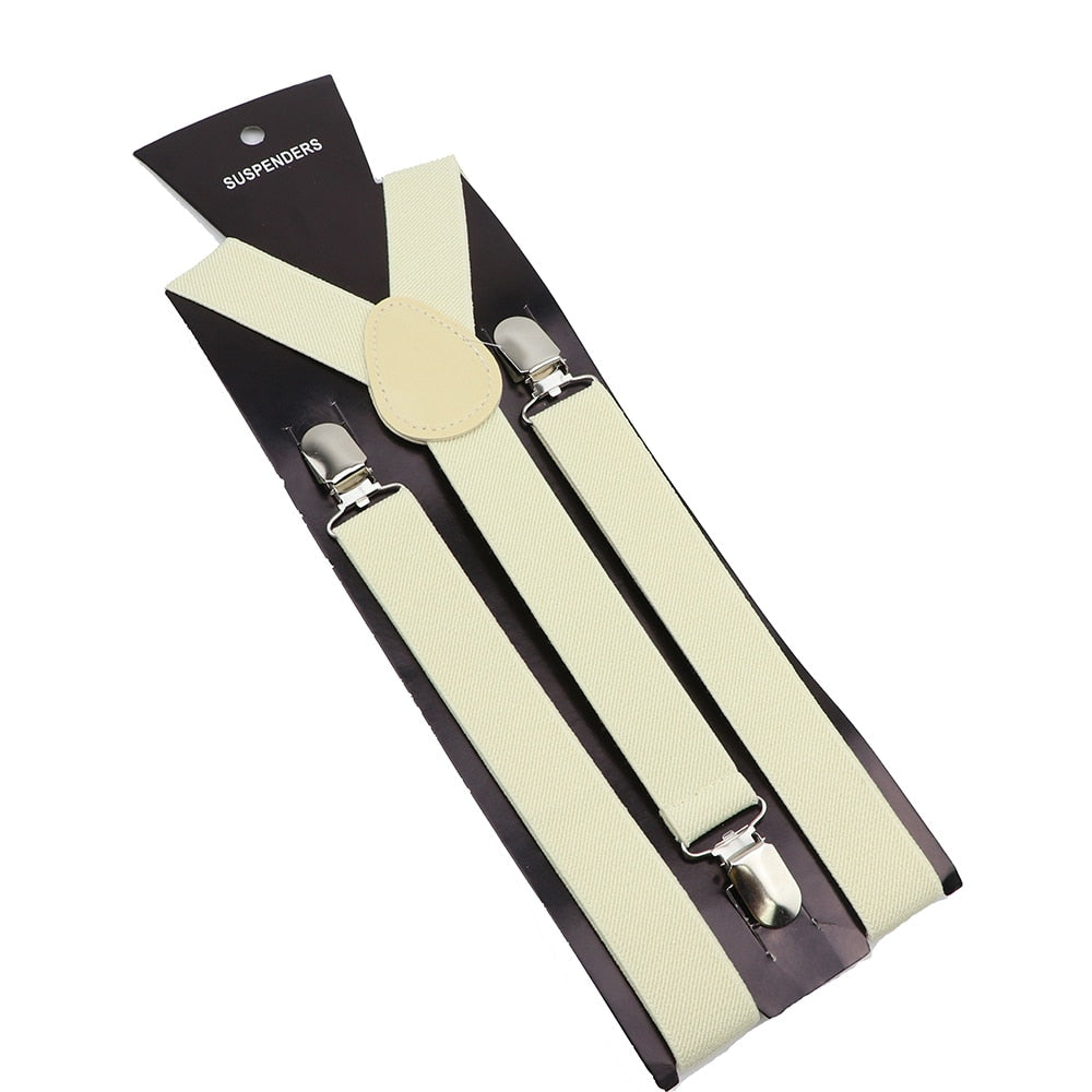 Leather Suspenders With Elastic Adjustable Straps. Comes in a variety of solid Colors.