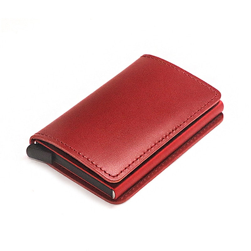 100% Genuine Leather Card Holder. RFID Protected 100% Genuine Leather. Metal side for credit cards to slide in.