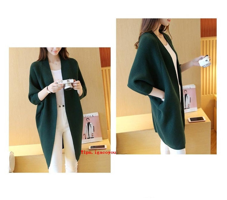 Ladies Long Knitted, bat sleeve Sweater.