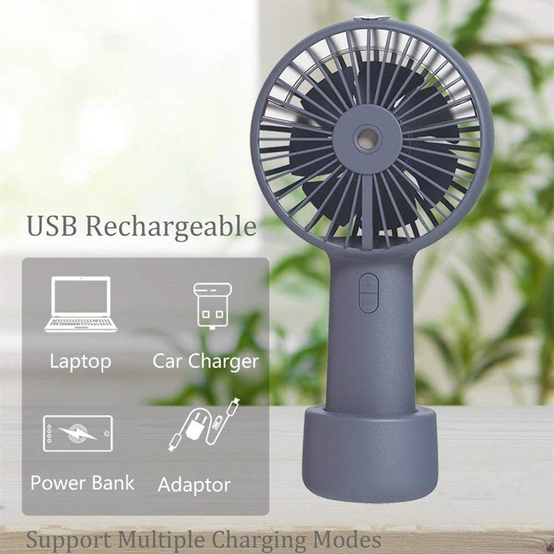USB Rechargeable Handheld Mini cooling fan with water spray mist.