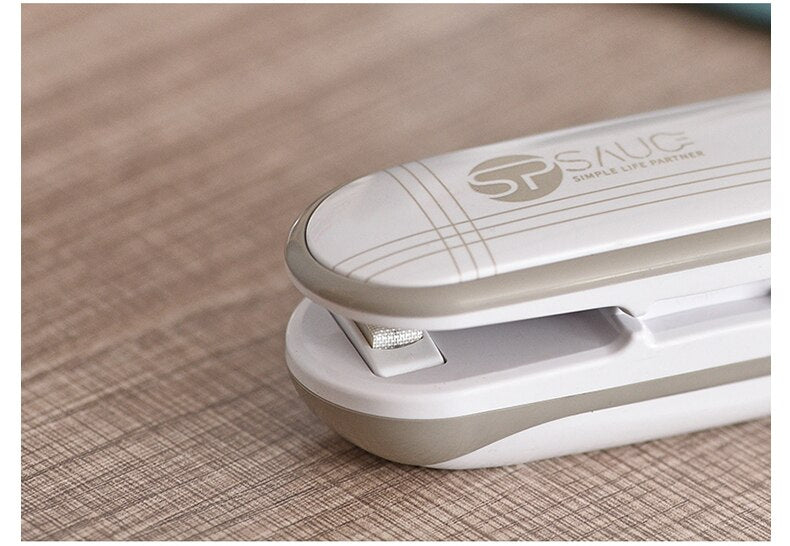 Mini vacuum heat sealer. Great to reseal snack bags etc.