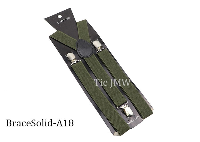Leather Suspenders With Elastic Adjustable Straps. Comes in a variety of solid Colors.