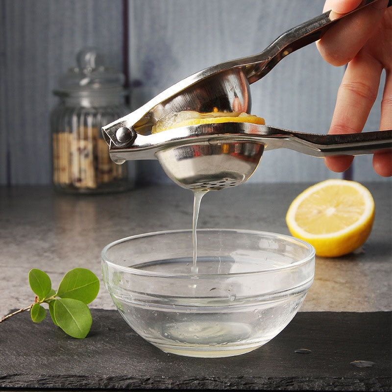 Stainless Steel Citrus Fruits Squeezer. Manually squeeze oranges, lemons and limes.