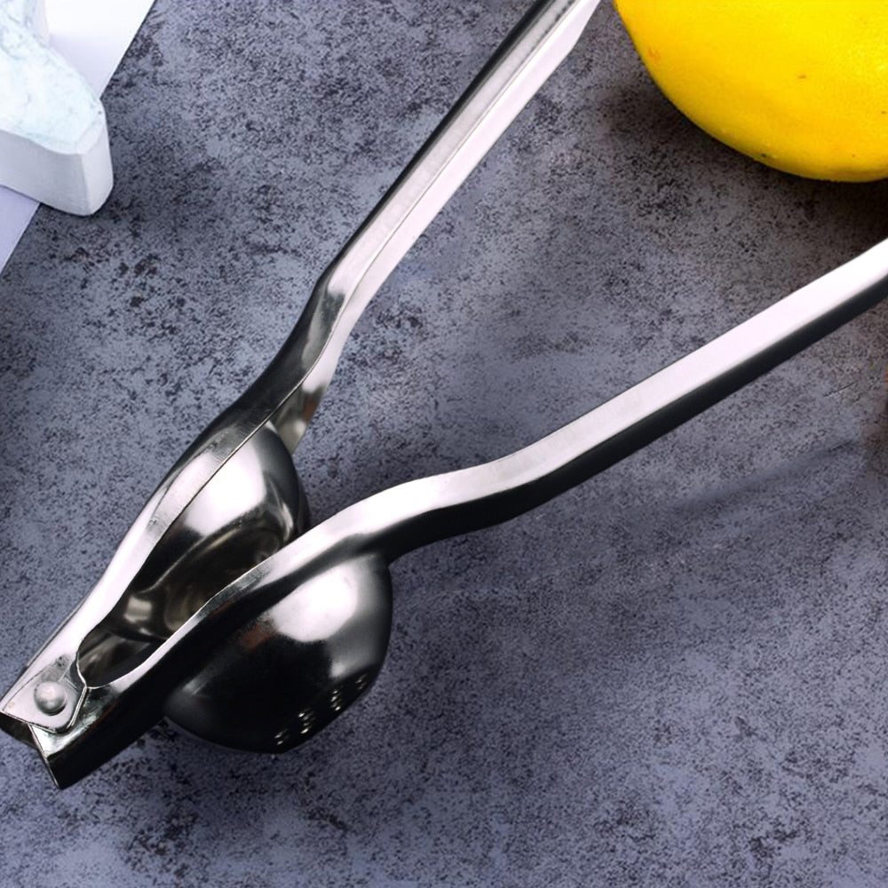 Stainless Steel Citrus Fruits Squeezer. Manually squeeze oranges, lemons and limes.