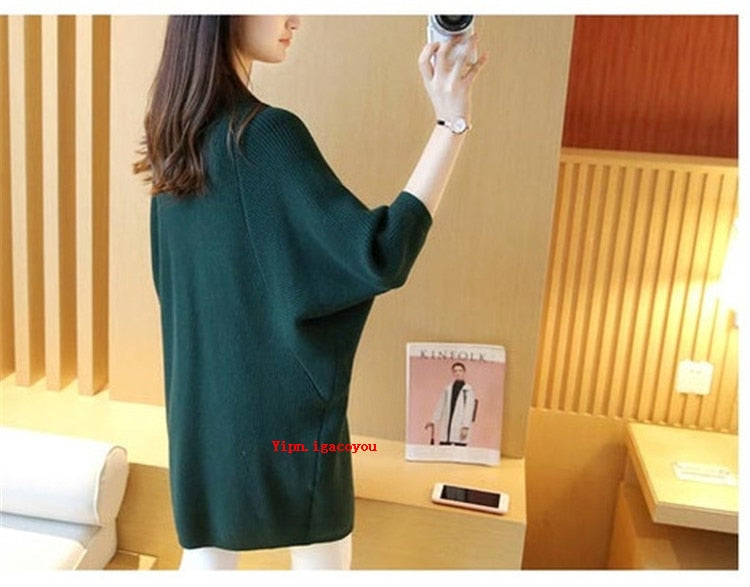 Ladies Long Knitted, bat sleeve Sweater.