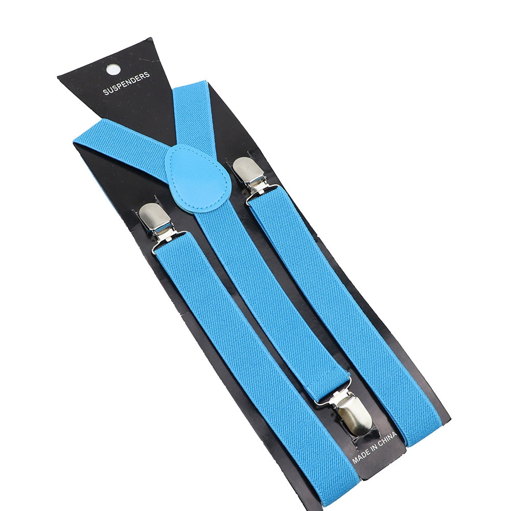 Leather Suspenders With Elastic Adjustable Straps. Comes in a variety of solid Colors.