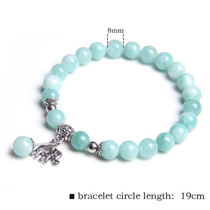 Ladies blue amazonite beaded bracelet with a metal elephant charm.