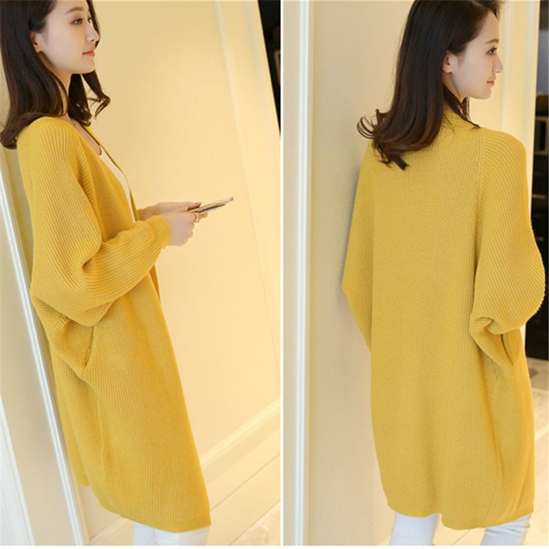 Ladies Long Knitted, bat sleeve Sweater.