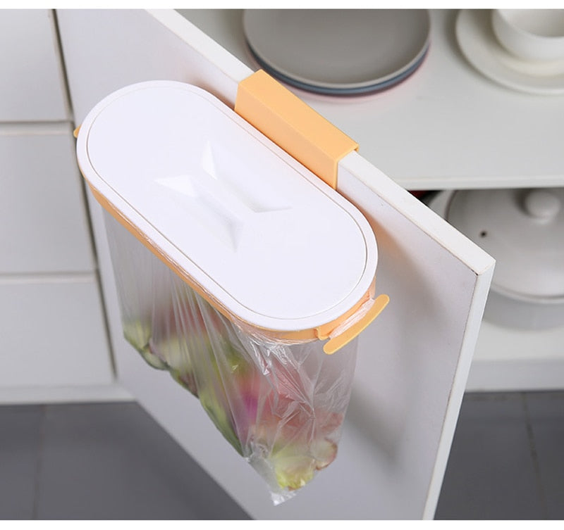 Kitchen Garbage Bag Rack that hangs on the front or back of the cupboard door. Great for quick access