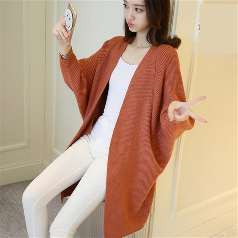 Ladies Long Knitted, bat sleeve Sweater.