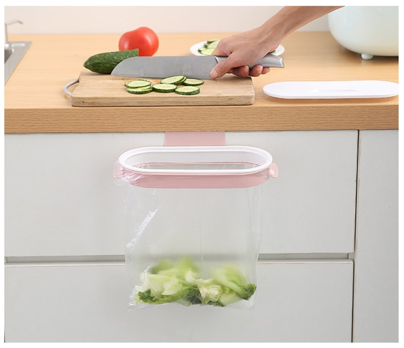 Kitchen Garbage Bag Rack that hangs on the front or back of the cupboard door. Great for quick access