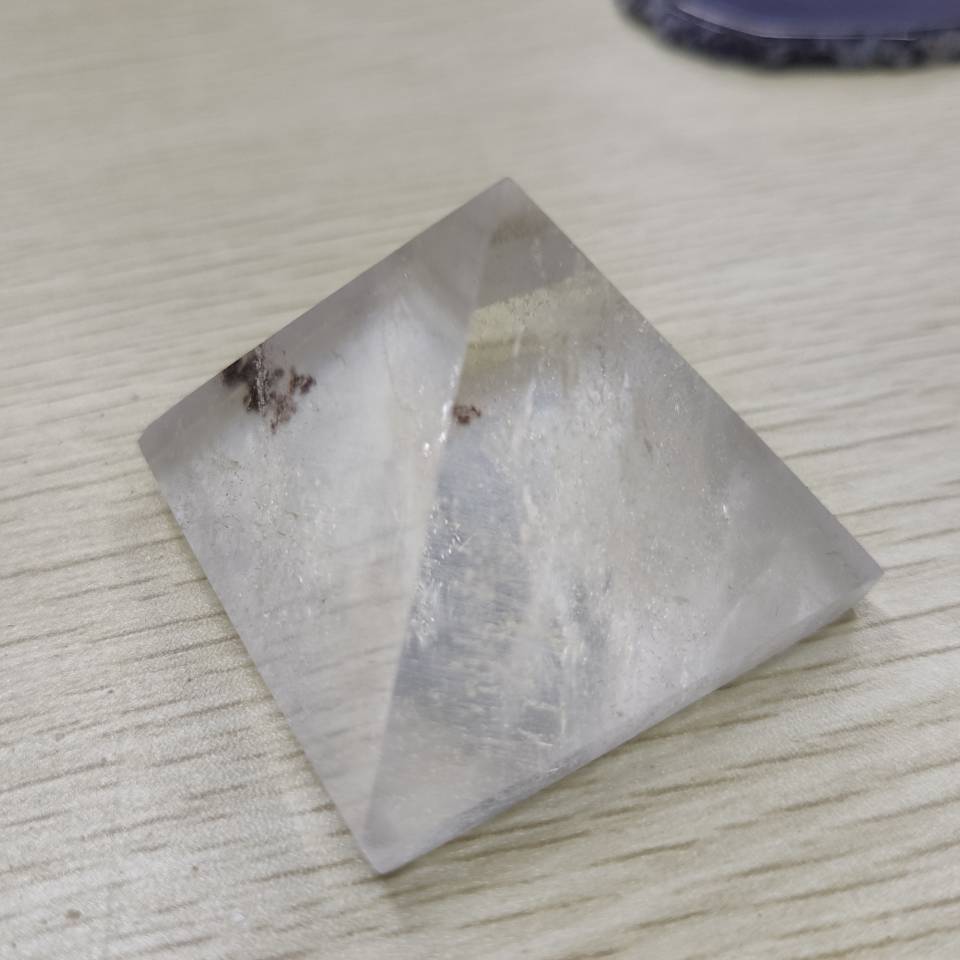 Natural Transparent Quartz Reiki Pyramid Healing crystal.