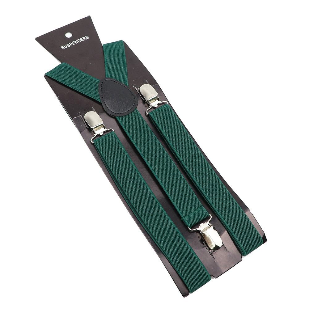 Leather Suspenders With Elastic Adjustable Straps. Comes in a variety of solid Colors.