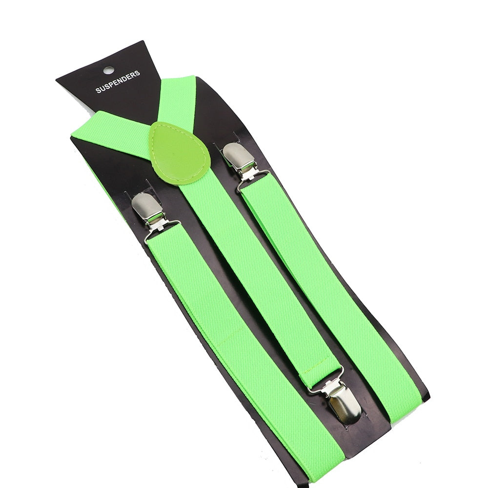Leather Suspenders With Elastic Adjustable Straps. Comes in a variety of solid Colors.