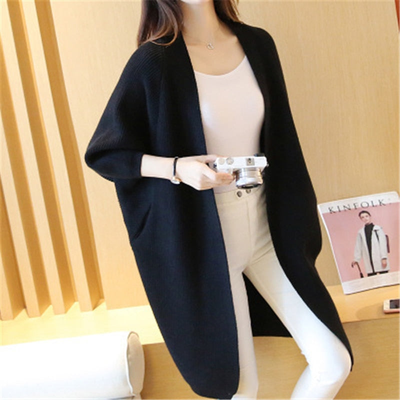 Ladies Long Knitted, bat sleeve Sweater.