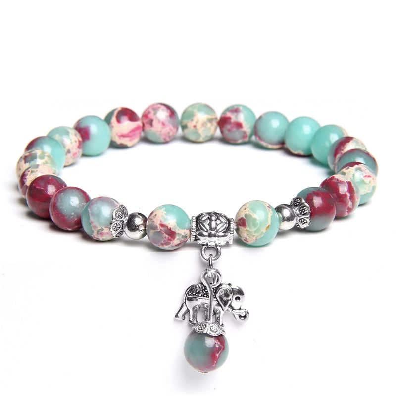 Ladies blue amazonite beaded bracelet with a metal elephant charm.