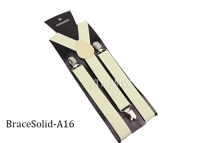 Leather Suspenders With Elastic Adjustable Straps. Comes in a variety of solid Colors.