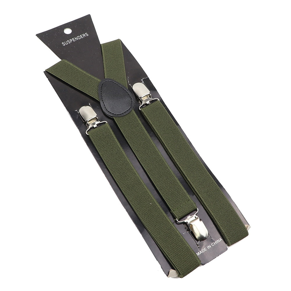 Leather Suspenders With Elastic Adjustable Straps. Comes in a variety of solid Colors.