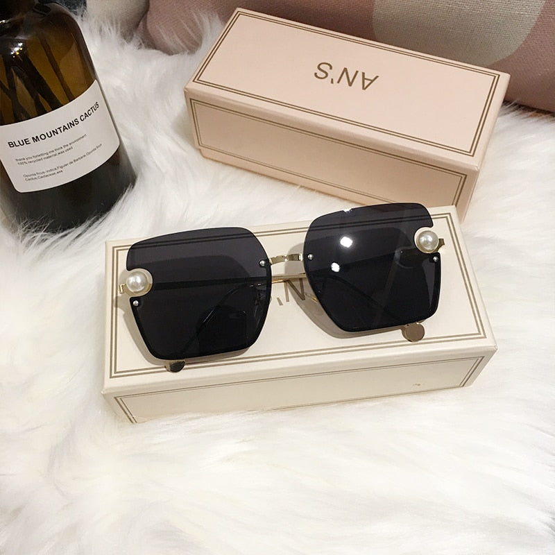 Ladies Rimless Sunglasses UV400 pearl.