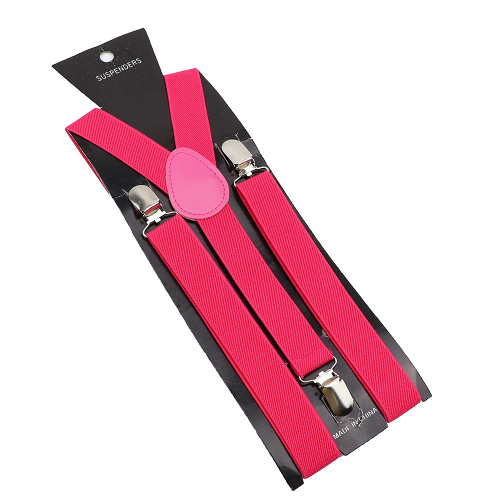 Leather Suspenders With Elastic Adjustable Straps. Comes in a variety of solid Colors.