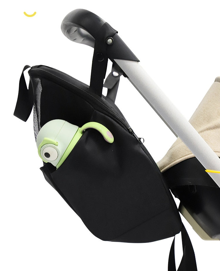 Stroller organizer bag for diapers, baby bottles and toys.
