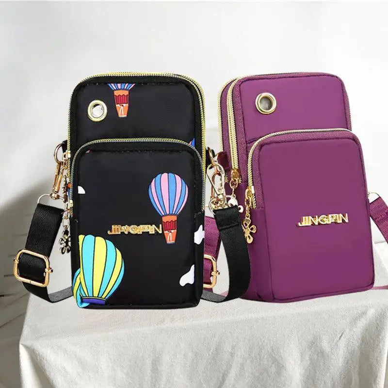 Mobile Phone Crossbody/Shoulder Bag With Headphone Plug.