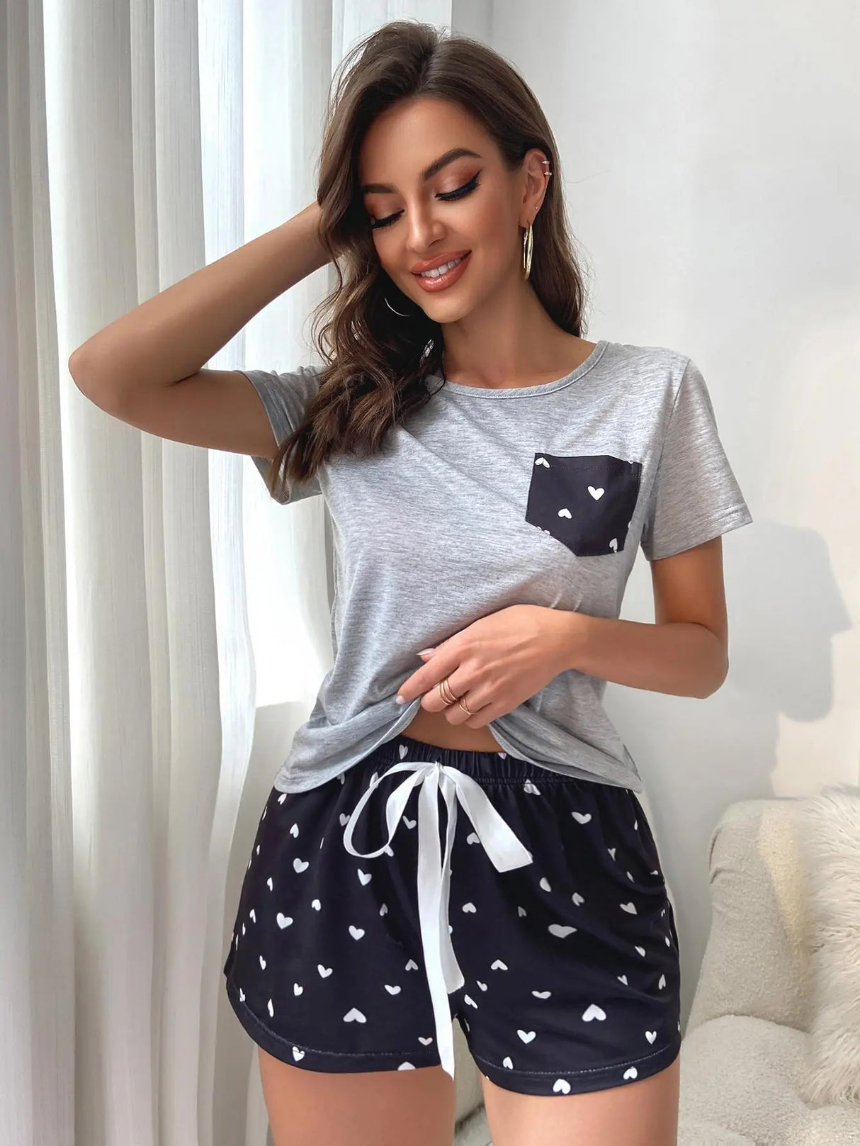 Women's Pajamas Set With Tee Shirt And Elastic Drawstring Shorts.