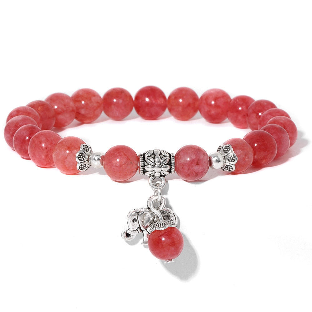 Ladies blue amazonite beaded bracelet with a metal elephant charm.