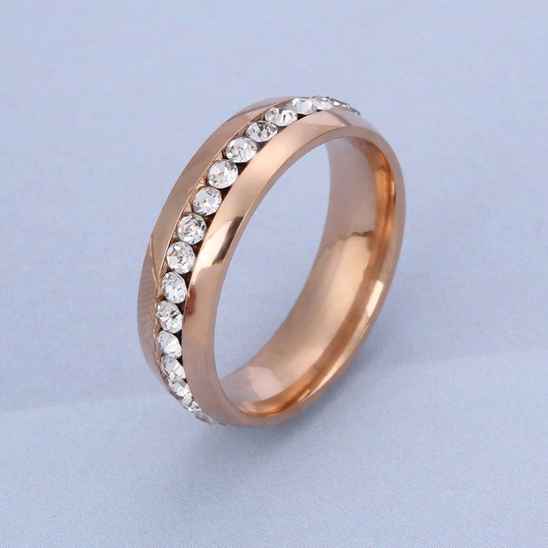 Woman's Exquisite Stainless Steel wedding Ring. Comes in Black, Gold or Silver.