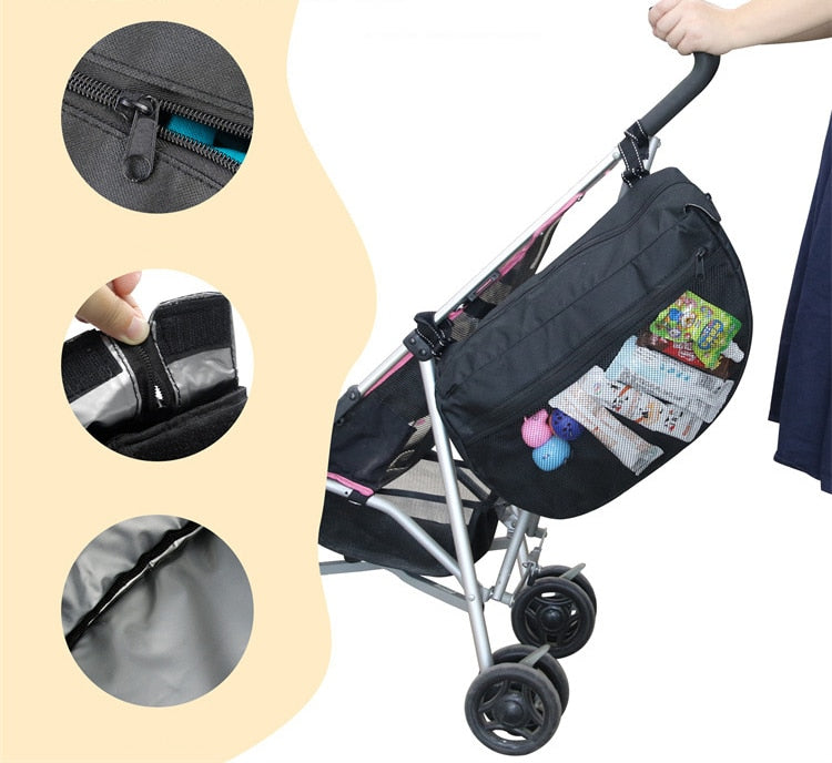 Stroller organizer bag for diapers, baby bottles and toys.