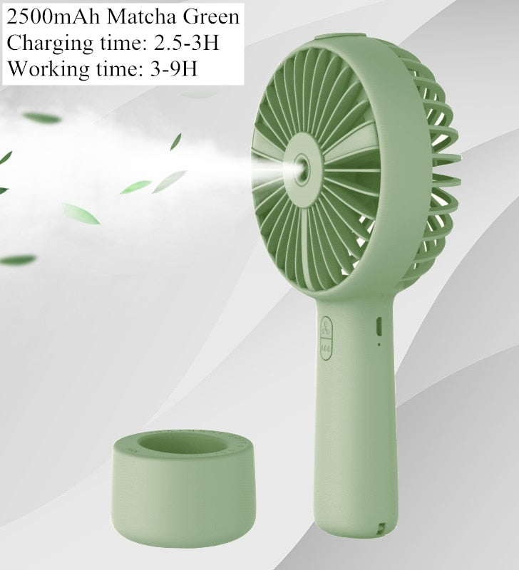 USB Rechargeable Handheld Mini cooling fan with water spray mist.