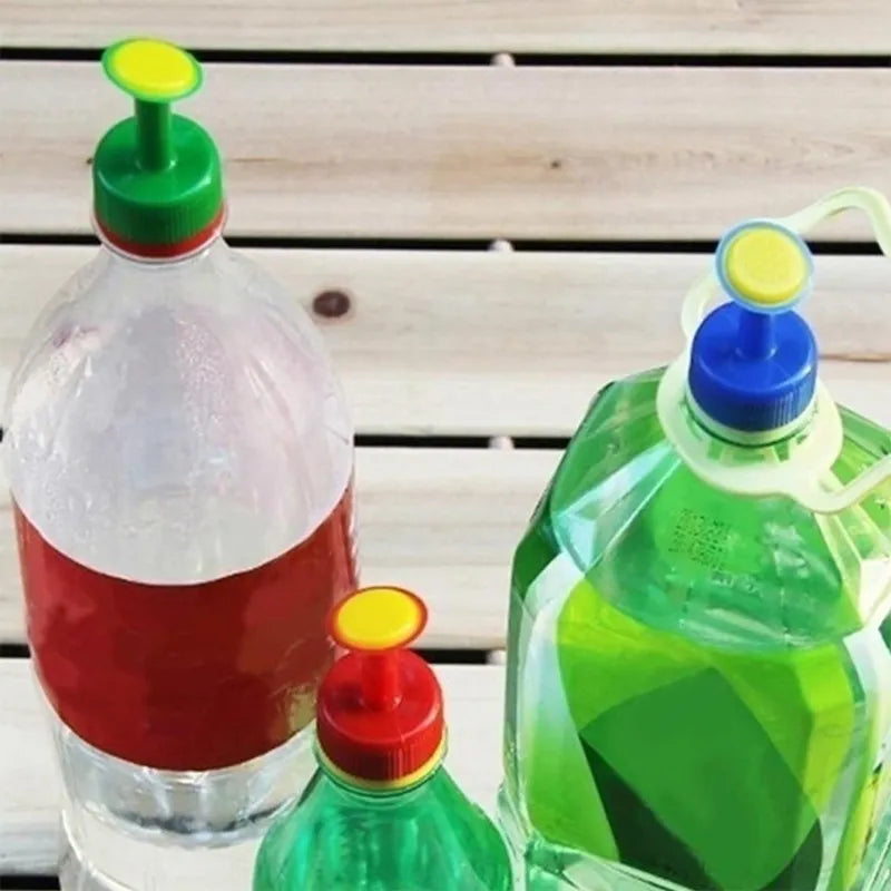Plant Watering Spray-Head Attachment That Fits Soft Drink Bottles.