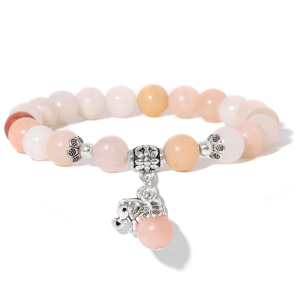 Ladies blue amazonite beaded bracelet with a metal elephant charm.