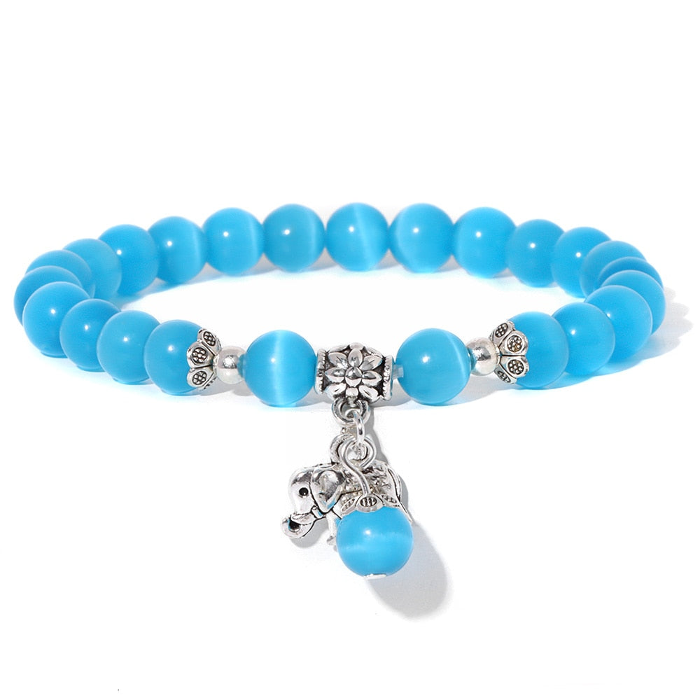 Ladies blue amazonite beaded bracelet with a metal elephant charm.