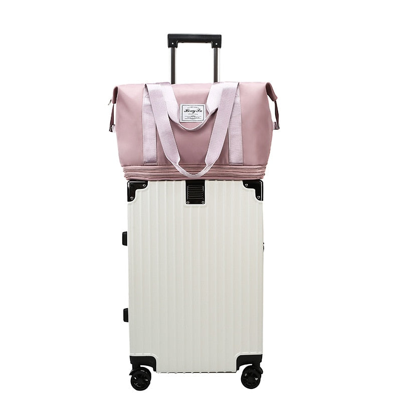 Women's AOTTLA casual handbag/carry on luggage bag for traveling. Double zipper on bottom to expand bag..