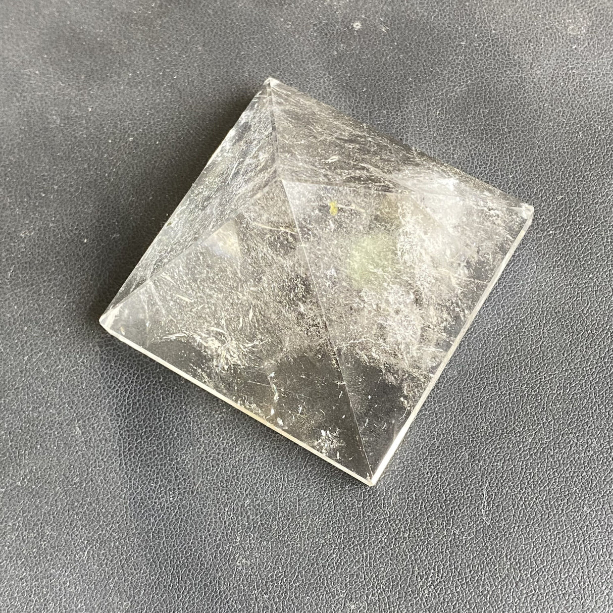 Natural Transparent Quartz Reiki Pyramid Healing crystal.