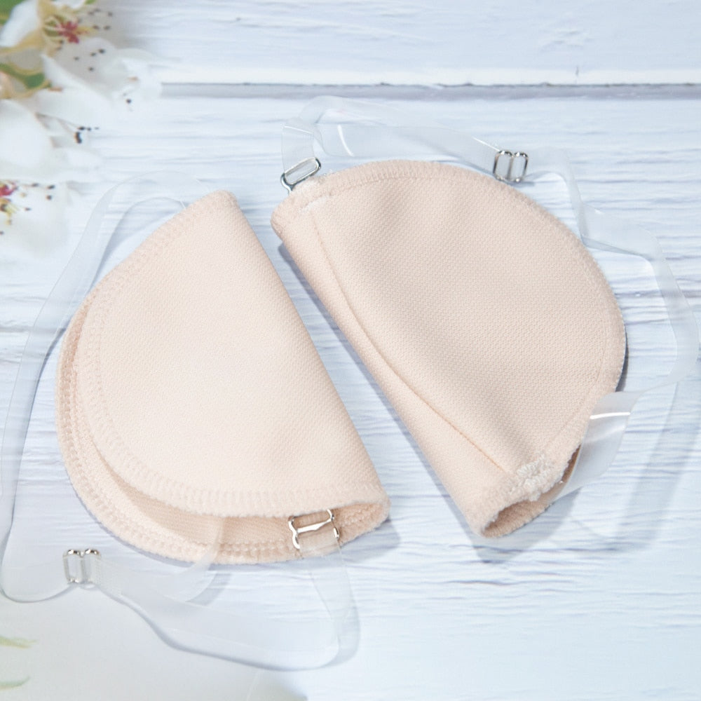 Perspiration Pads that attach over your shoulder. Absorbing, Washable Shields to protect your best dress.