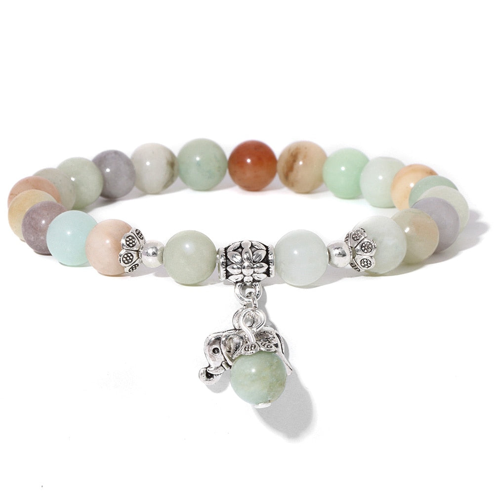 Ladies blue amazonite beaded bracelet with a metal elephant charm.
