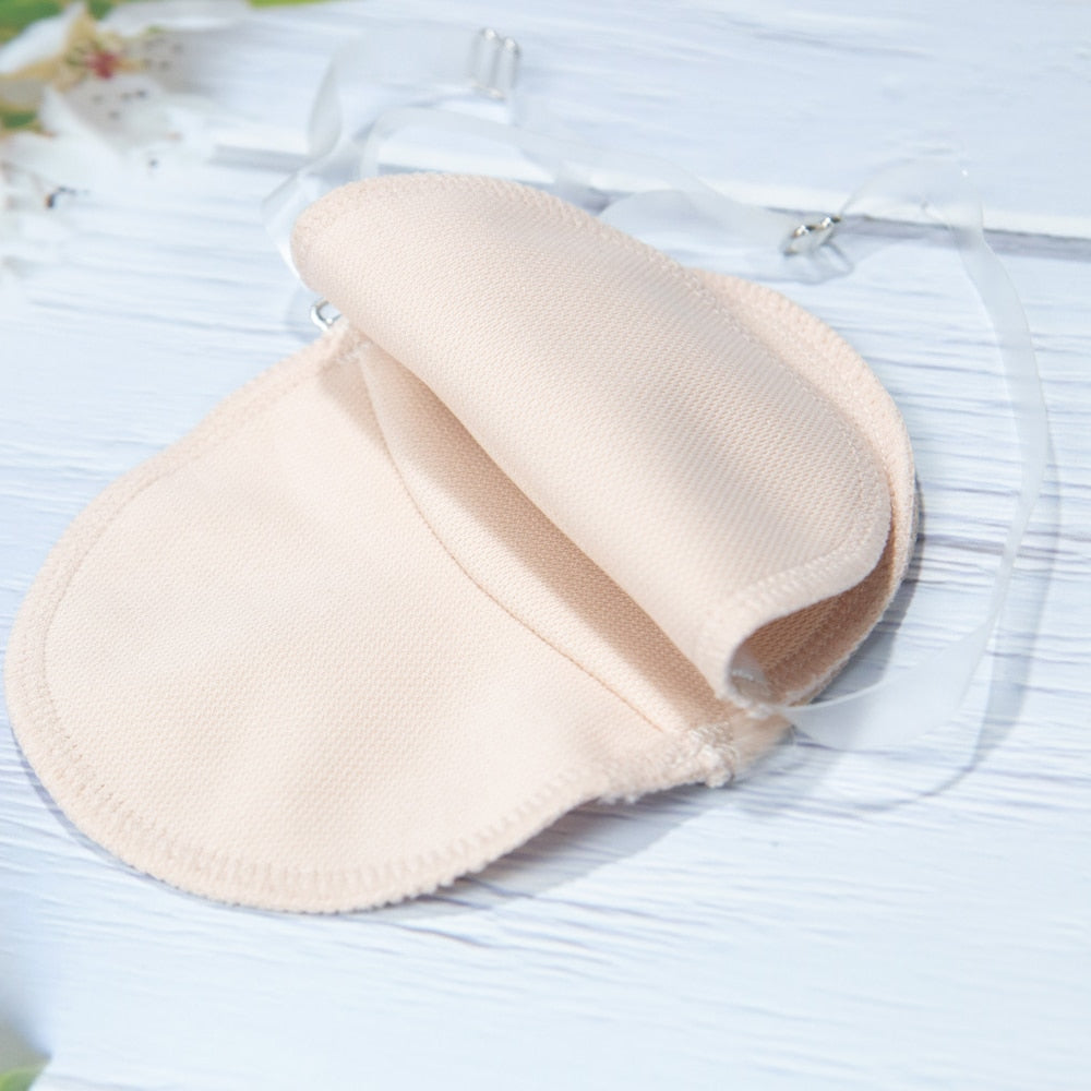 Perspiration Pads that attach over your shoulder. Absorbing, Washable Shields to protect your best dress.