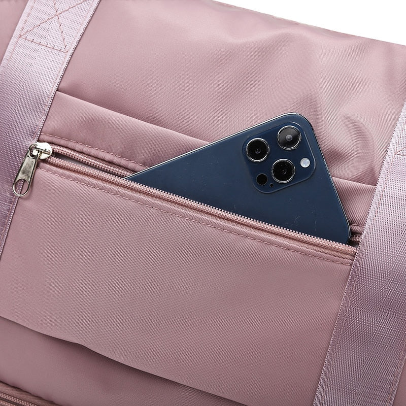 Women's AOTTLA casual handbag/carry on luggage bag for traveling. Double zipper on bottom to expand bag..