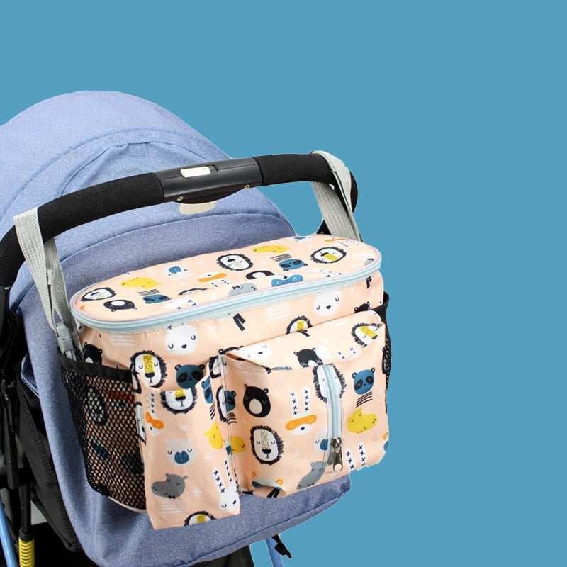 Stroller organizer bag for diapers, baby bottles and toys.