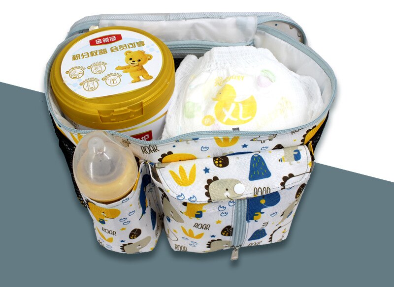 Stroller organizer bag for diapers, baby bottles and toys.
