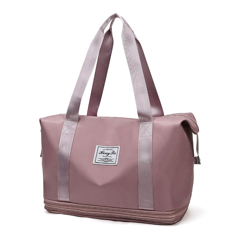 Women's AOTTLA casual handbag/carry on luggage bag for traveling. Double zipper on bottom to expand bag..