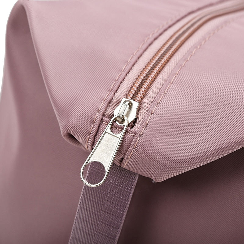 Women's AOTTLA casual handbag/carry on luggage bag for traveling. Double zipper on bottom to expand bag..